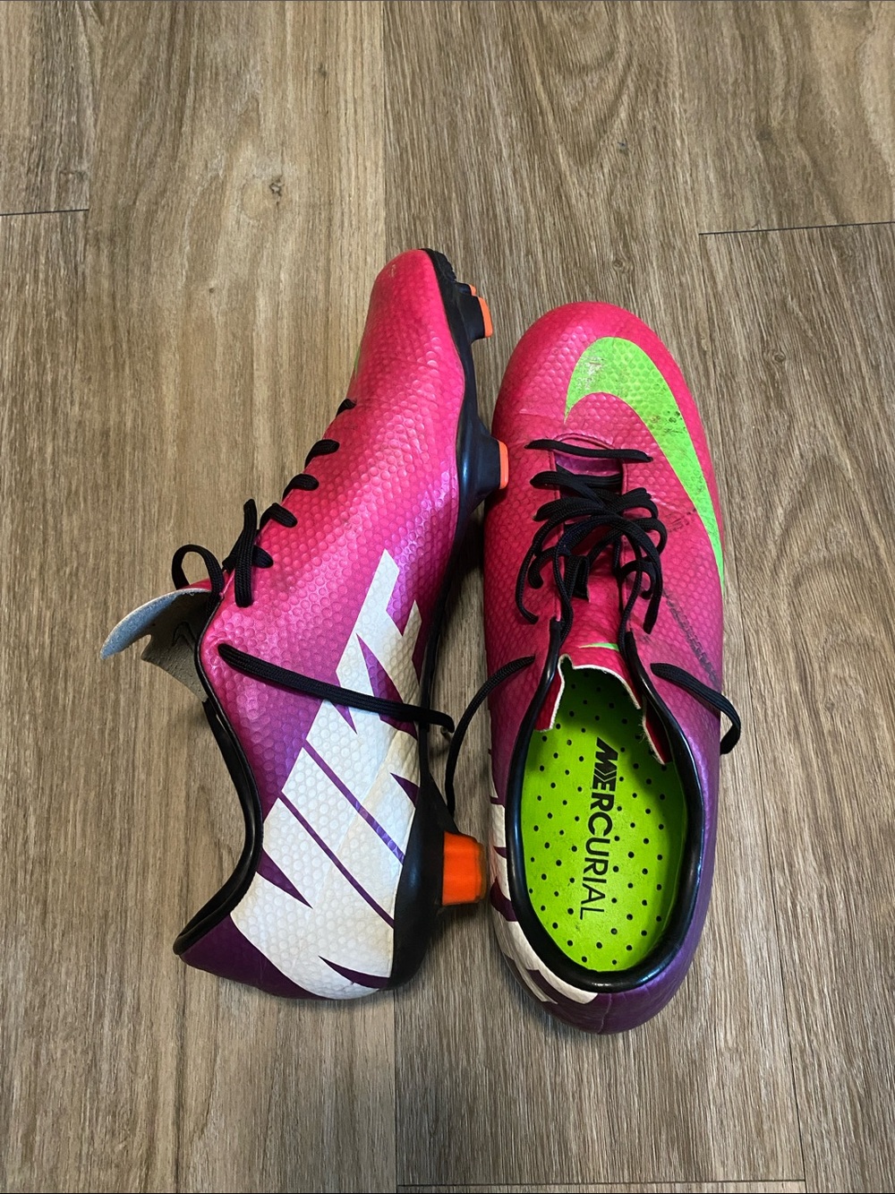 Nike Women's Pink Soccer Cleats with Neon Green Swoosh